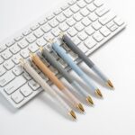 Linbsunne Ballpoint Pens Black Medium Point 1mm Pen with Super Soft Grip Ball Point Pen for Men Women Retractable Pens (gold-12 pcs) - Image 8