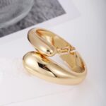 Gold Polished Chunky Twisted Hinged Waterdrop Bangle Bracelet for Women Spiraled Oval Bangle Bracelet - Image 5