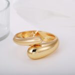 Gold Polished Chunky Twisted Hinged Waterdrop Bangle Bracelet for Women Spiraled Oval Bangle Bracelet - Image 6