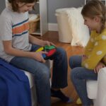 Hasbro Gaming Simon Handheld Electronic Memory Game With Lights and Sounds for Kids Ages 8 and Up - Image 7