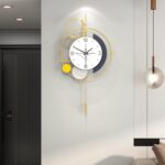 FLEBLE Modern Wall Clock with Pendulum Silent Decorative Wall Clock Battery Operated Gold Unique Large Clock for Living Room,Kitchen,Bedroom Home Decor Gift Idea,13x22.8 inches - Image 2